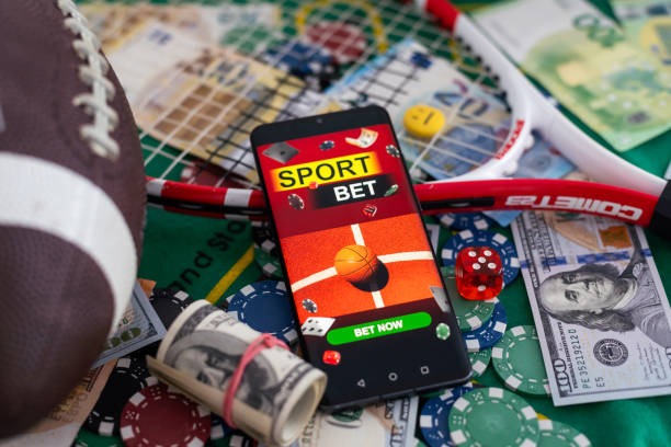 Mobile phone displaying live football match with gacha sportsbook interface